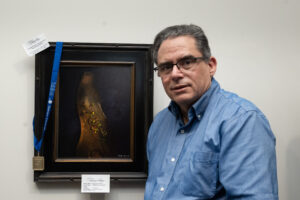 Bobby Izquierdo with Forsythia in Bud Vase