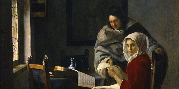 Classical painting by Johannes Vermeer showing two women in an interior illuminated by window light